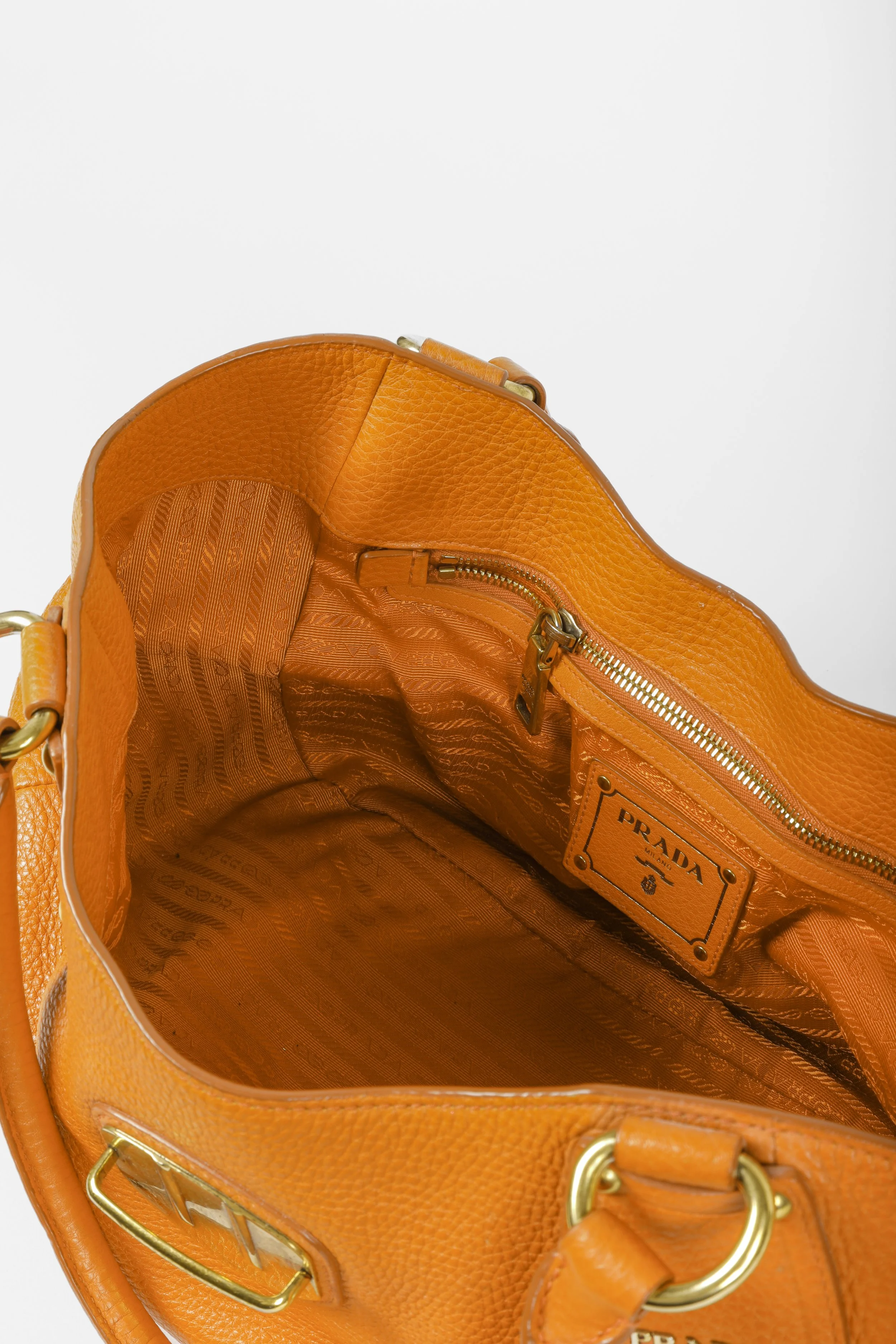 Prada orange 2025 leather bag